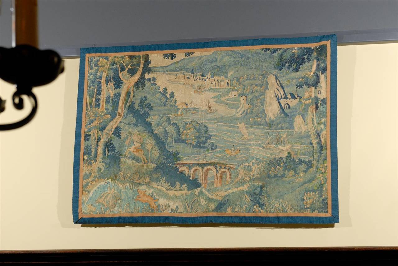 Tapestries were meant to keep castle rooms warm.  They decorated the stone walls with interesting scenes. This tapestry is not a fragment but rather as you can see an entire scene.  And what an interesting countryside we are presented with.  There