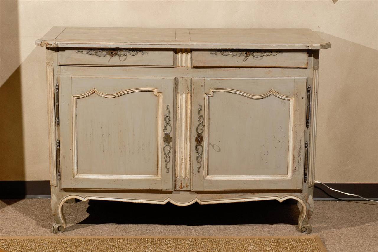 Late 19th Century French Grey Painted Oak Buffet, Circa 1880
The paint on this classic oak buffet is not original to the piece but it is very well done and adds interest and new look.  It has handsome, old iron hardware which is original and the