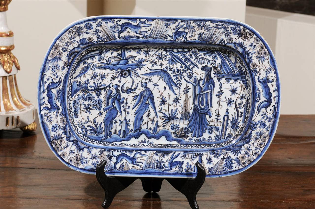 19th Century Blue and White  Italian Faience Platter, Circa 1895
Blue and white is always a classic and very popular right now.  We found this platter in the south of France and loved the whimsical animals pouncing around the border surrounding the