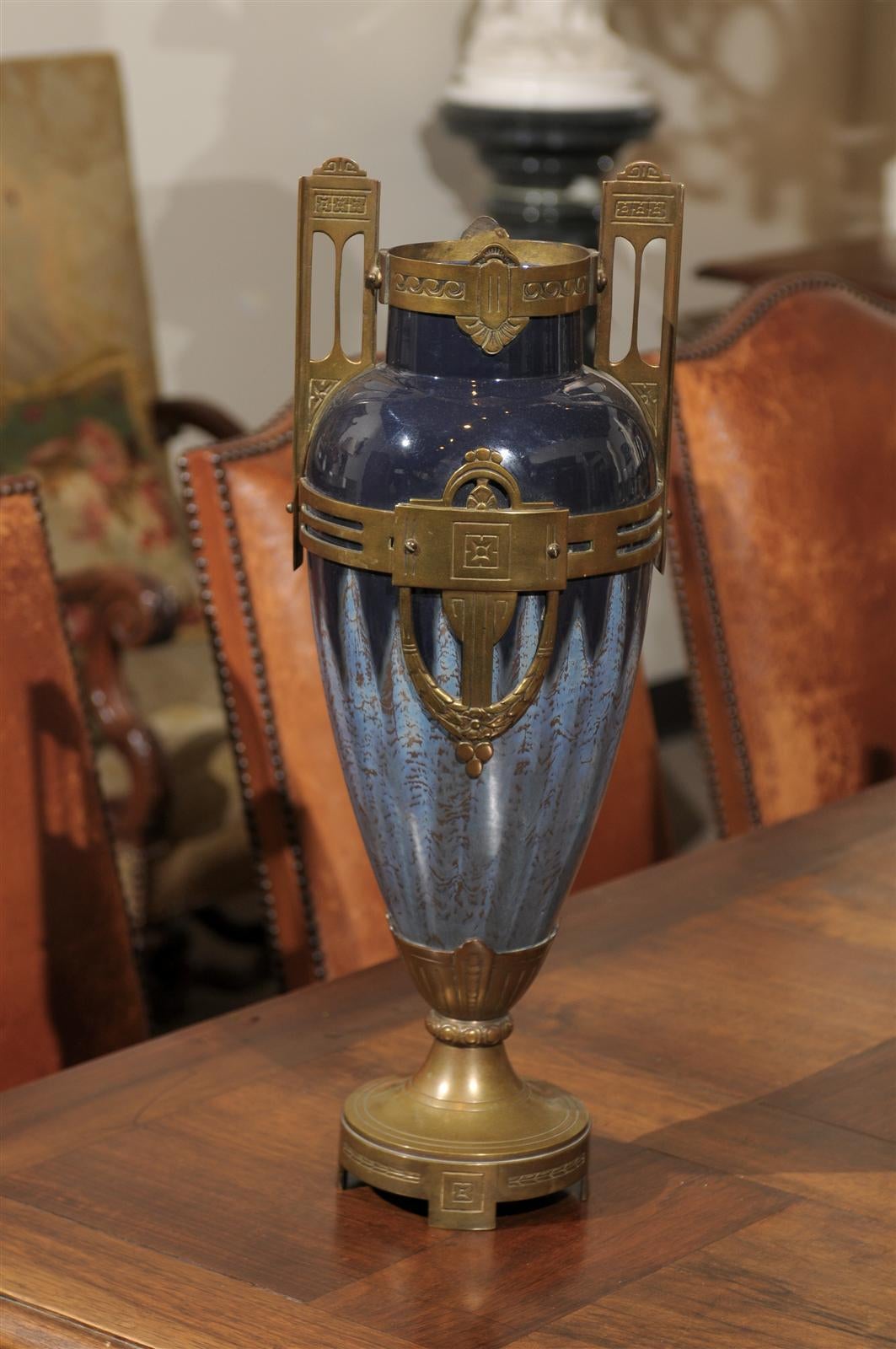 Napoleon lll  Blue Porcelain Vase with Bronze Fittings, Circa 1880
When a spot calls for a tall, single piece it can be hard find.  This is a beautiful vase with lovely blue glazed finish and substantial bronze handles and base.