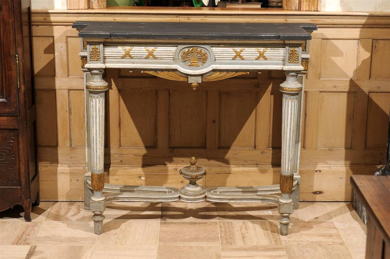 A great looking console that just came in on our new shipment.  It has very classic styling in a neutral palette.  The back legs are positioned outside the front legs which gives this piece a little different slant.  We love the height and the price!
