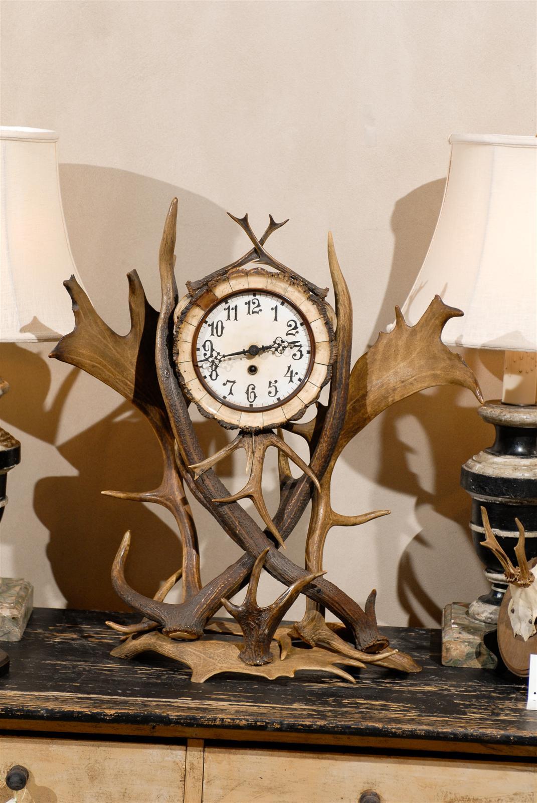 19th Century German Antler Clock, Circa 1875
This very interesting collection of antlers makes a wonderful surround for a simple round clock.  This clock has great height and looks great on a tabletop or mantel. 