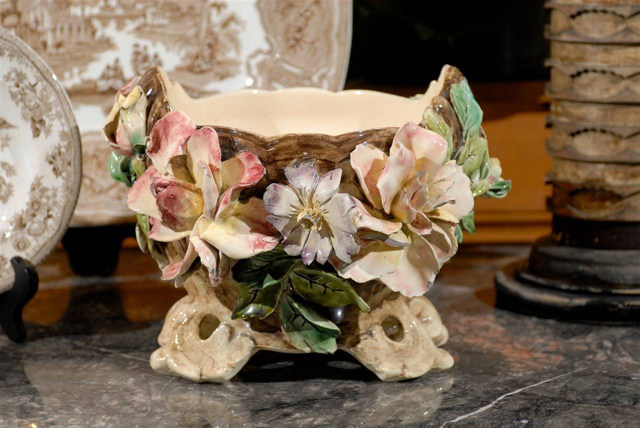 Vintage French Majolica Cachepot with Flowers, Circa 1920
This cachepot makes you smile!  When you look at it you can imagine being in a garden surrounded by beautiful blooming flowers.  Then you can add a few flowers or plants of your own.