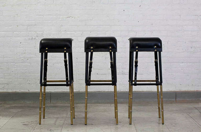 Jacques Adnet - Set of 6 black leather stools, circa 1950.
Metal and leather.