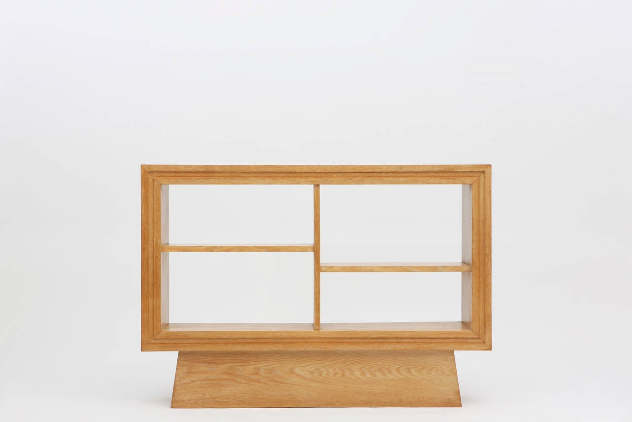 Suzanne Guiguichon set of two bookcases, circa 1930.
Oak and oak veneer.

Large measures: 33 H x 47.25 W x 10 D inches / 83.8 H x 120 W x 25.4 D cm.
Small measures: 33 H x 35.25 W x 10 D inches / 83.8 H x 89.5 W x 25.4 D cm.