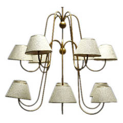 Royère 1950s brass twelve-arm Chandelier