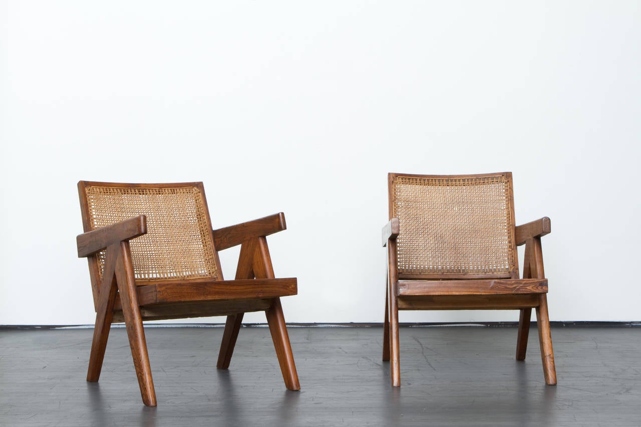 Pierre Jeanneret, pair of lounge chairs, circa 1955.
Cane and bleached teak.