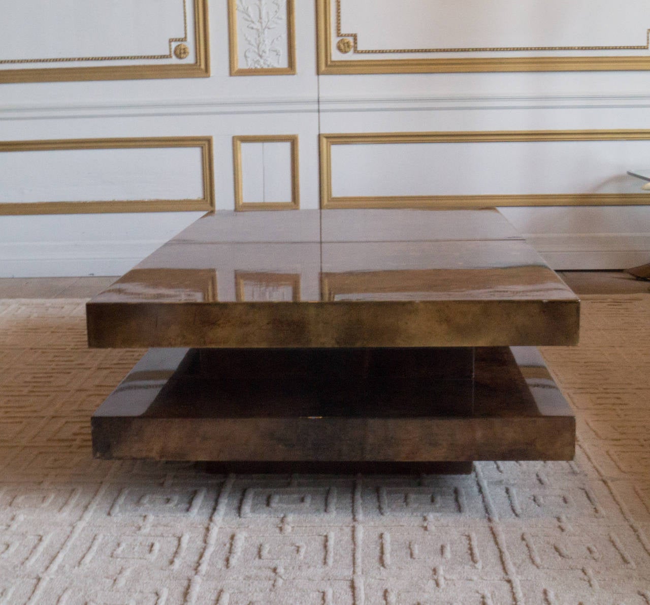 Modernist lacquered goatskin coffee or cocktail table by Aldo Tura, the top opens and extends to reveal a mirrored bar compartment.