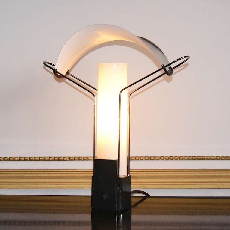 Pair of Table Lamps by Arteluce with a glass diffuser and a bent shade made of Aluminum.