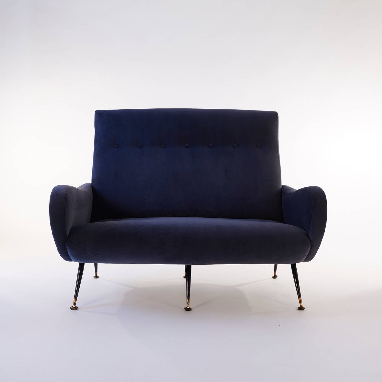 Beautiful settee in the style of Marco Zanuso reupholstered in a deep blue cotton velvet.