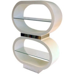 LACQUERED LINEN AND CHROME ETAGERE IN THE STYLE OF MILO BAUGHMAN