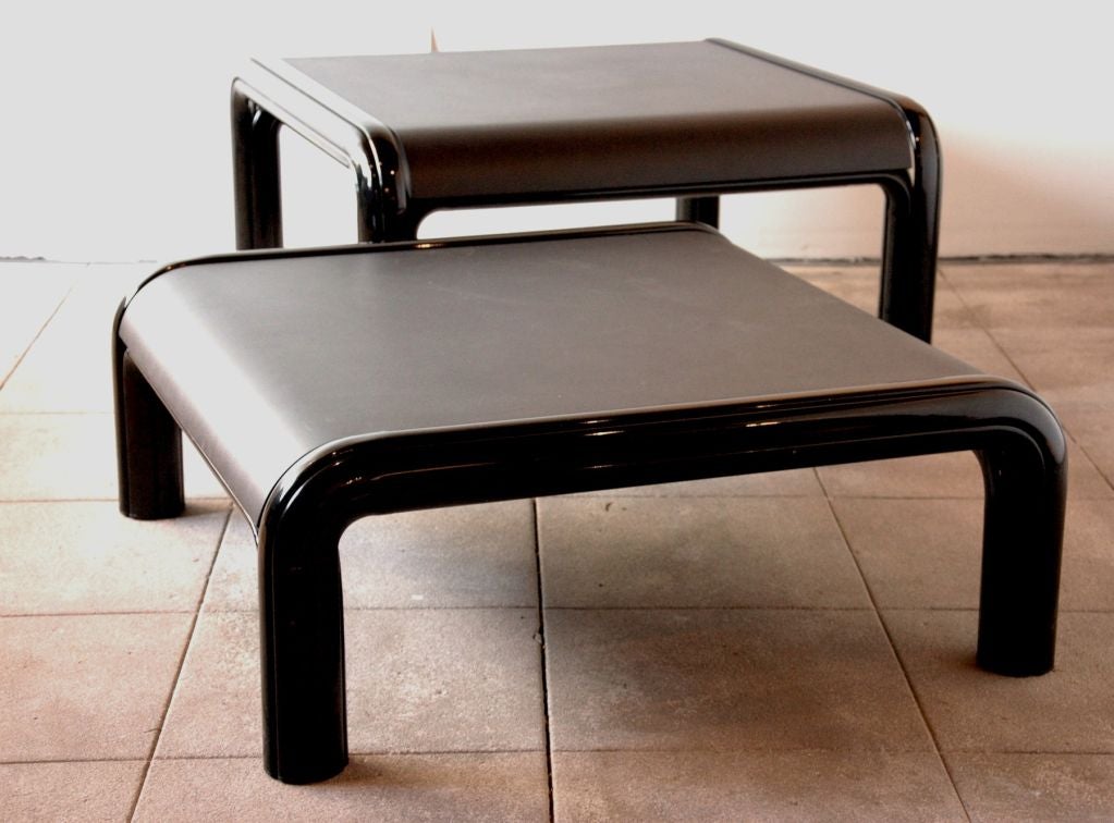 Pair of coffee tables designed by Gae Aulenti for Knoll in 1975 in extruded aluminum frames with a black fused finish and black laminate tops.