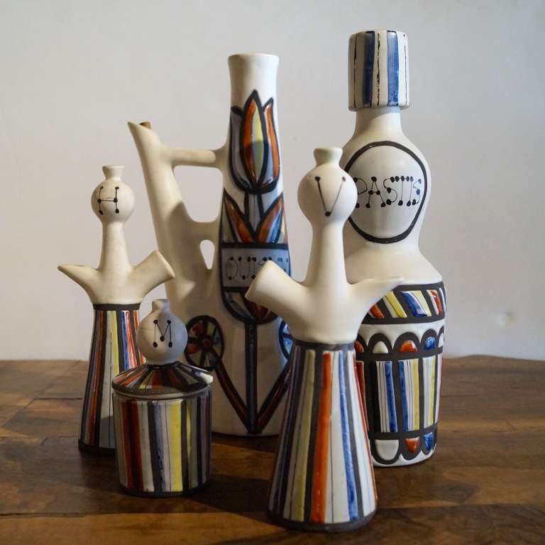 5 Piece Vallauris Pottery Service, Signed Capron. All pieces retain signature on bottom.

Roger Capron was born in Vicennes, a suburb of Paris, France on September 4, 1922.  He attended the School of Applied Arts in Paris from 1939 to 1943. In