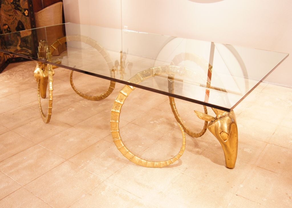 Rare bronze table signed Chervet and numbered 27/150 by Leon Francois Chervet, French. The glass top was recently made.