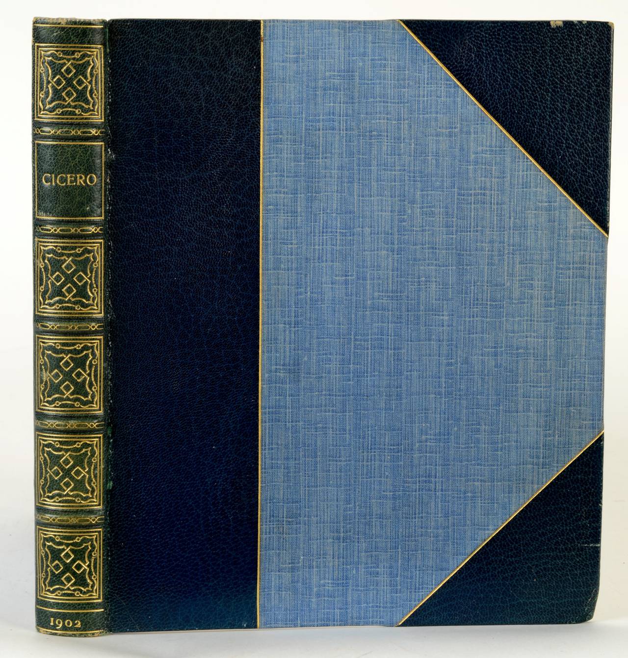 This handsome book is has a 3/4 Blue Morrocan cover. Gilt-bumped edge. Top edge is gilt and the other edges are deckled.