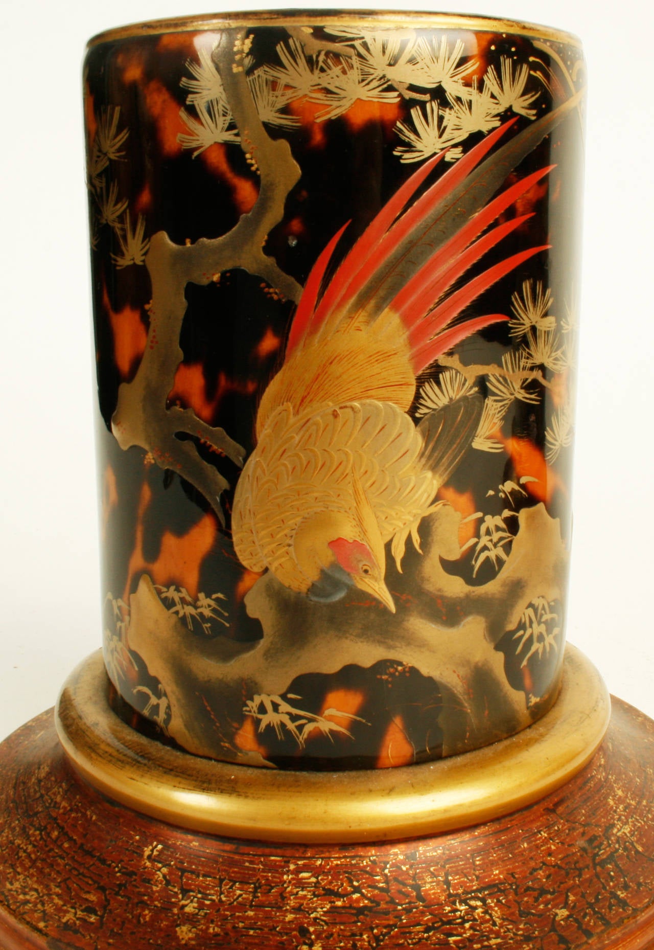 This pair of Japanese brush pots are made with beautiful tortoiseshel. One is decorated with gilt Chinese peacocks with mother-of-pearl “eyes” in their tail feathers. The other has a Chinese pheasant. An exotic pair to display anywhere.
N.P. Trent