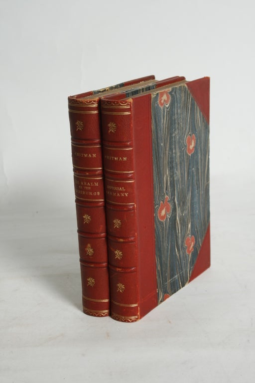 This pair of antique books are titled Imperial Germany and The Realm of the Habsburgs. They are both written by Sidney Whitman. They were published by Leipzig Bernhard Tauchnitz in 1890.