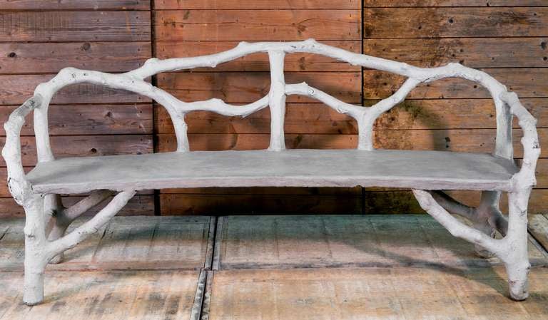 Faux-bois bench in grey from France circa 1950s.