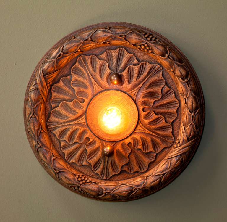 Belgian wooden flush mount light (circa 1930) crafted from a beautifully hand-carved ceiling medallion. Newly wired for use within the USA with a porcelain Edison socket and all UL listed parts. Multiple flush mounts available in a wide array of