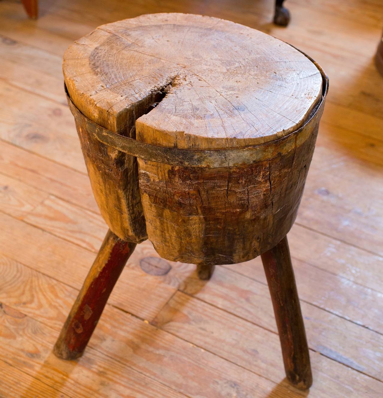 Rustic butcher block from France with iron banding around the top.
Is much larger than it appears in the photos. Hand-cut. The leg splay is approximately 21 inches. Would make a great side table.