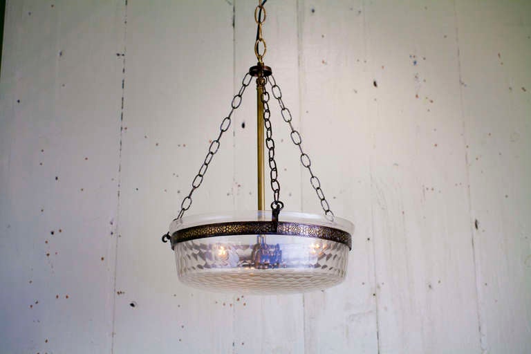 Hand-blown glass bowl with brass fittings, would be a great Hall Light.  Thumbprint design with three candelabra sockets 40 watts each. One could shorten the chain and use as a semi-flush mount.
This Anglo-Indian fixture is hand-made exclusively