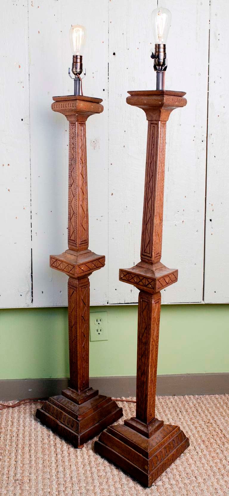Beautifully carved wood table lamps

Rewired in the United States with Edison sockets