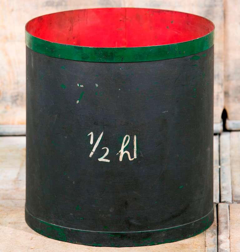 Industrial measure for liquid. Original paint with 1/2 HL marking. Black on outside with green rim red on inside. Belgium circa 1930s