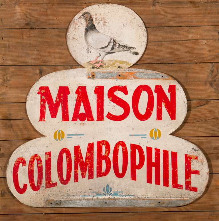 Vintage two-sided painted metal sign from Belgium. Would have been displayed by a Belgian carrier pigeon association. These associations would host pigeon races and other pigeon related activities.