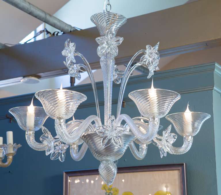 Murano chandelier with floral motif. Interesting ridged pattern on glass. Includes two types of hand-blown glass flowers. Re-wired for USA. All original parts.