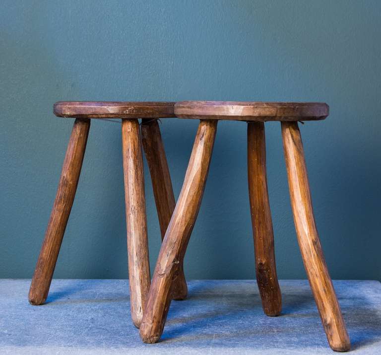 Hand-carved stools from France circa 1930s. Rustic look.