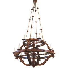 Vintage Grand wood chandelier with rope detail.