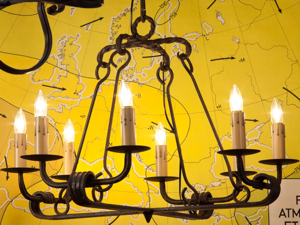 Our exclusive design, the Fayette chandelier is constructed of hand-forged iron and made in the USA. Four arms with two lights on each and a total of eight Edison based sockets. Height is to the top of the loop. Comes with handmade iron chain and