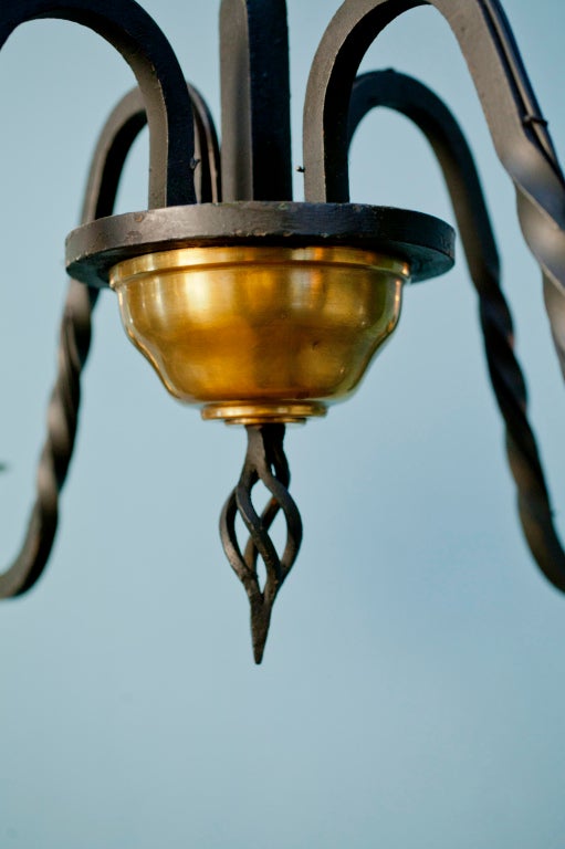 Mid-20th Century Four-Arm Wrought Iron and Brass Chandelier in the Style of Gilbert Poillerat