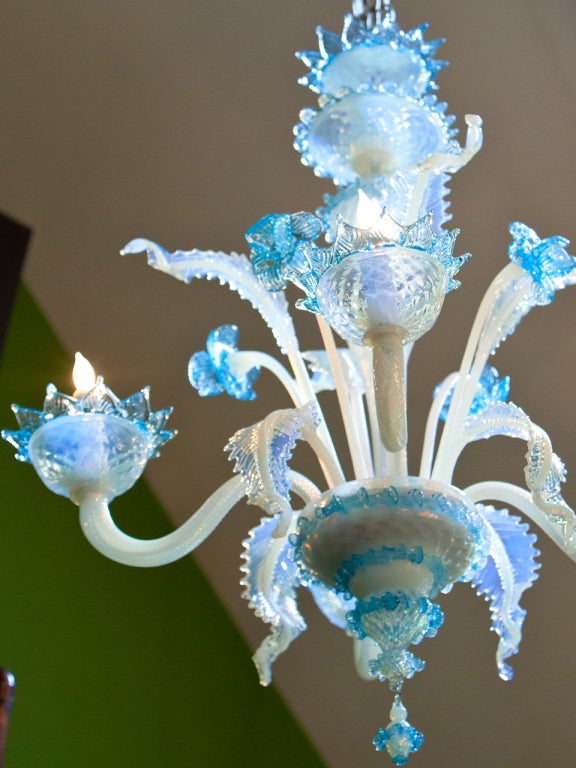 Hand blown Murano glass chandelier newly wired in the US.

The color is beautiful