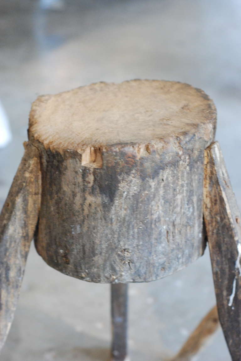 Primitive butcher block on tripod base, 19th century