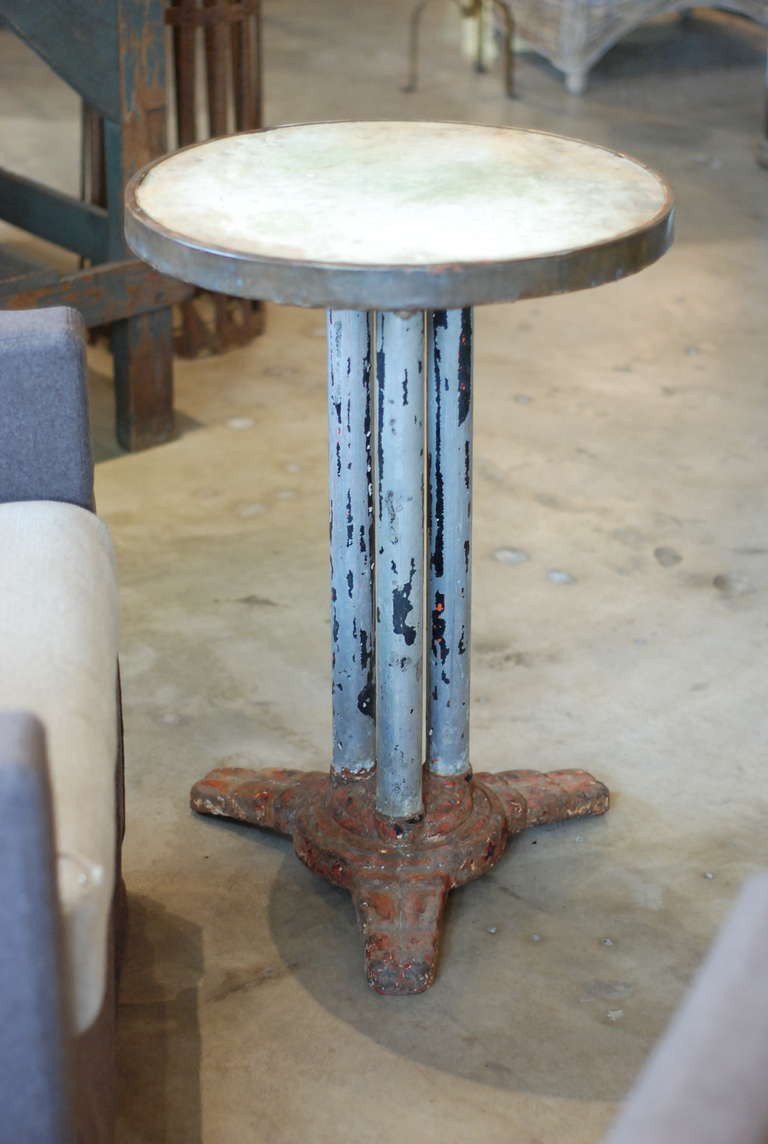 19th century French garden table with original stone top and brass banding.