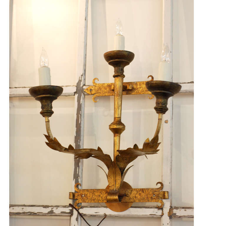 Set of four Spanish sconces, gilt iron, newly wired
