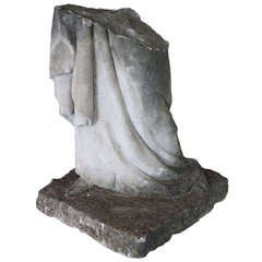 Carved Stone Fragment of Draped Lower Body