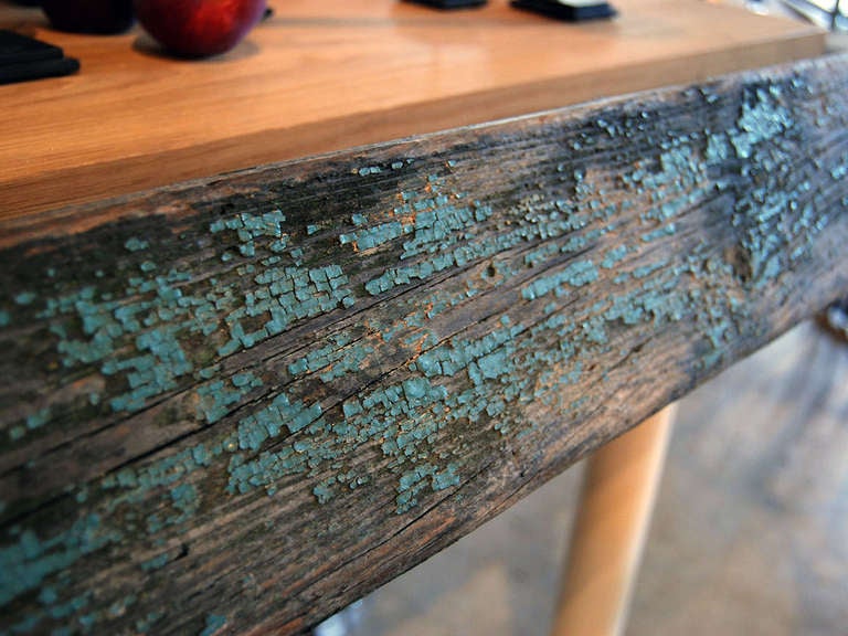Turn of the century faux bois garden bench in original turquoise paint.