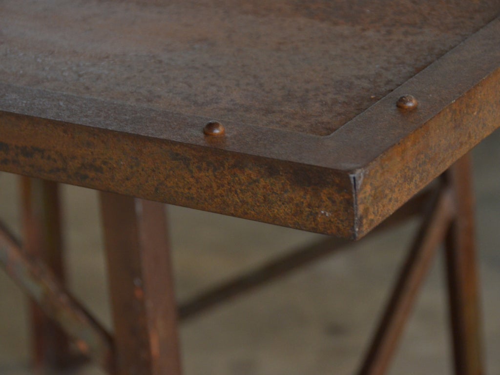 Industrial table with rivet detail 1