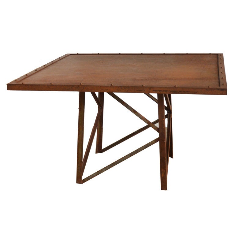 Industrial table with rivet detail