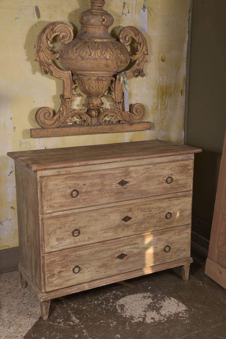 Small commode in scraped paint finish