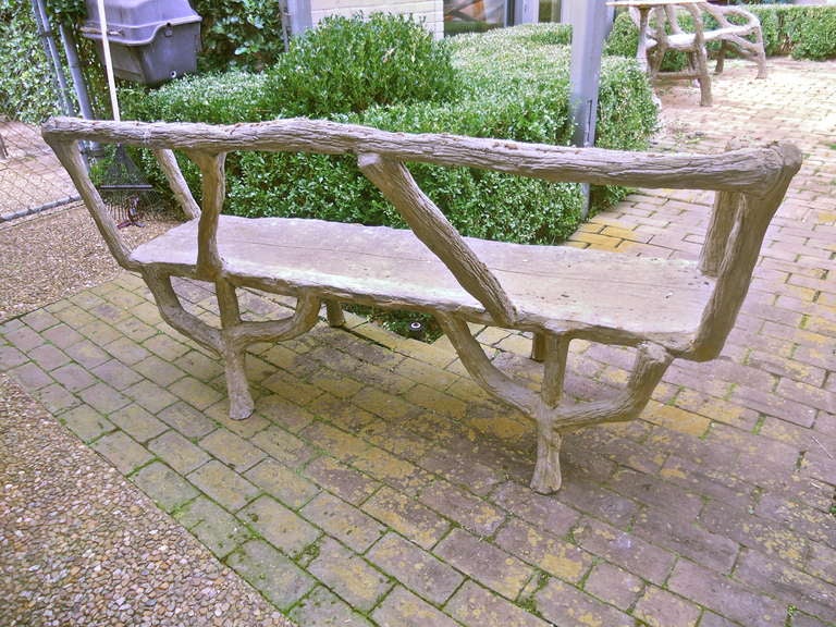 Quirky 20th. century French garden bench in cement. Seat 16