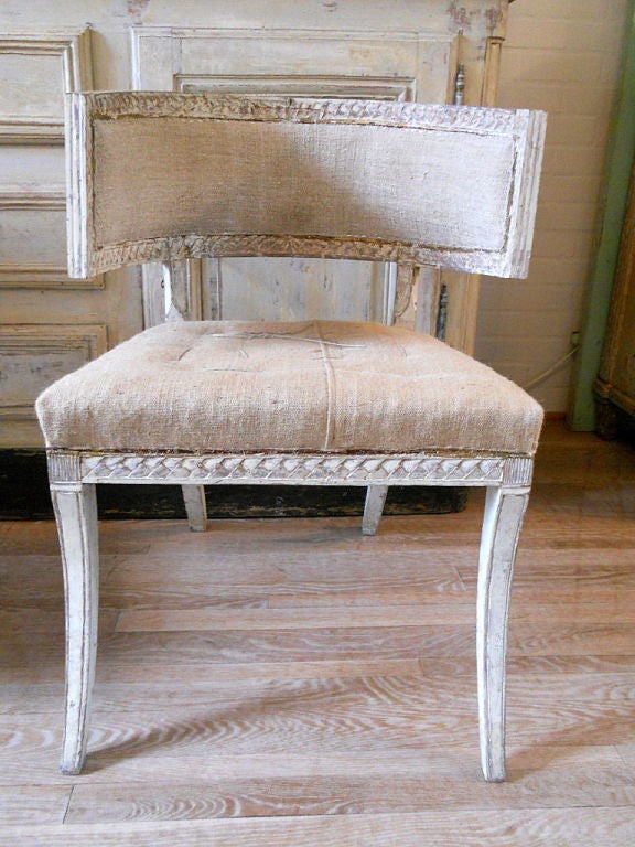 Handsome pair of Gustavian Klismos chairs. Beautiful detailed carving. Scraped to original color. Very comfortable.