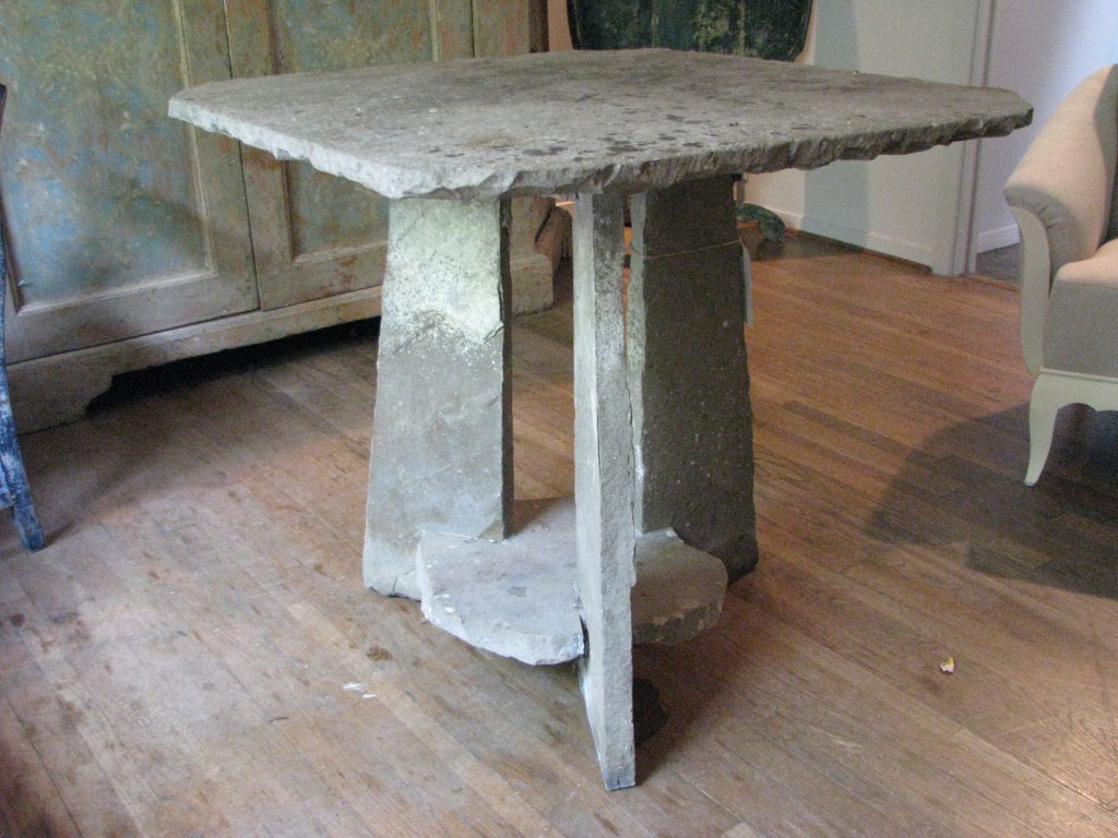 Handsome English Stone Table. Three legged base and top.