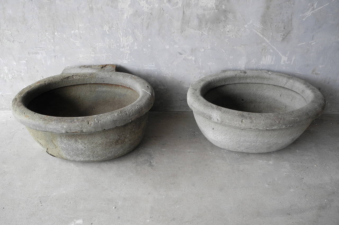 This pair of 18th century antique stone vessels originally sat in the 