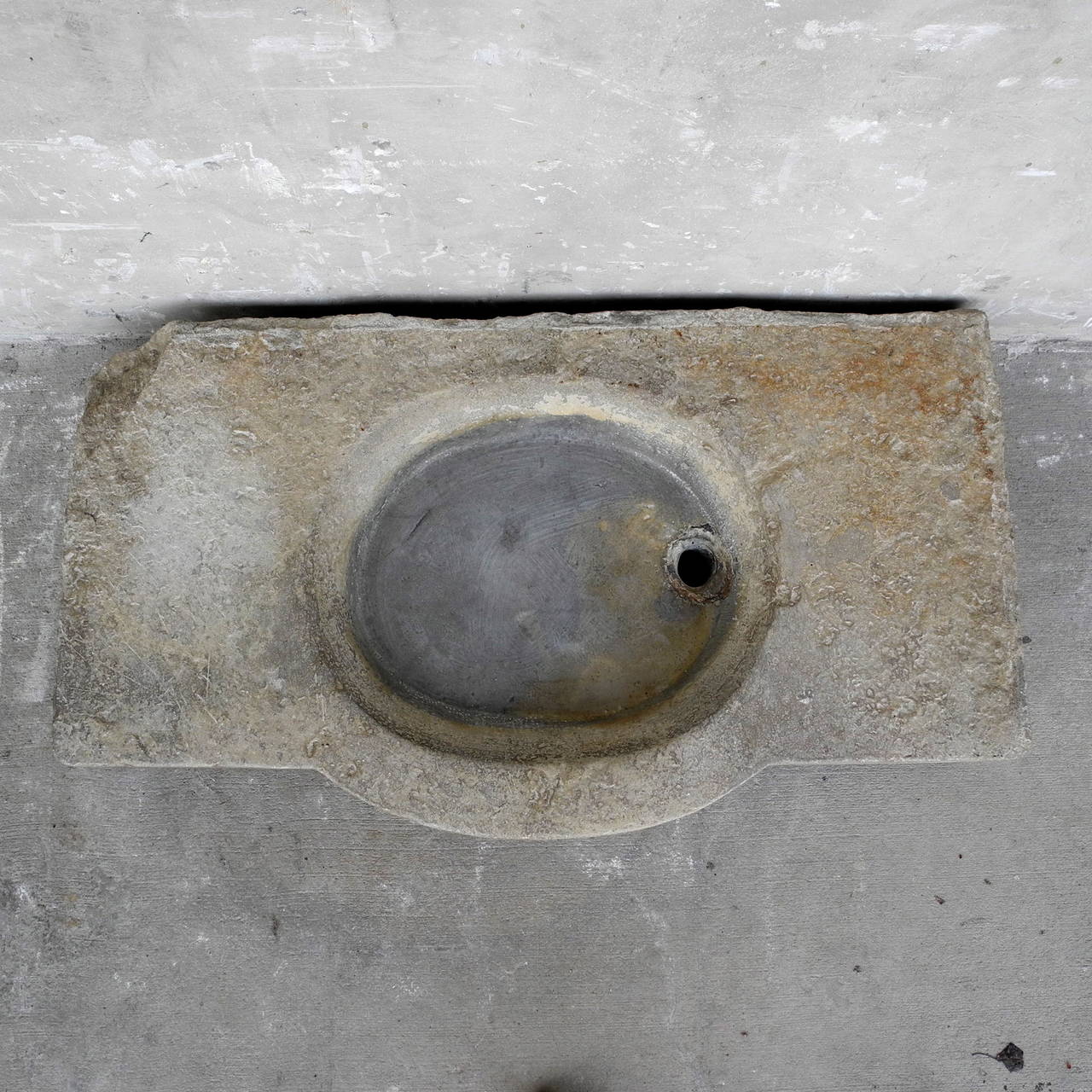 This 18th century stone evier was reclaimed from a village house in Pézenas, France. The beautifully mottled patina of the sink would make an interesting addition to any powder bath. 

The bowl depth is ±2.75