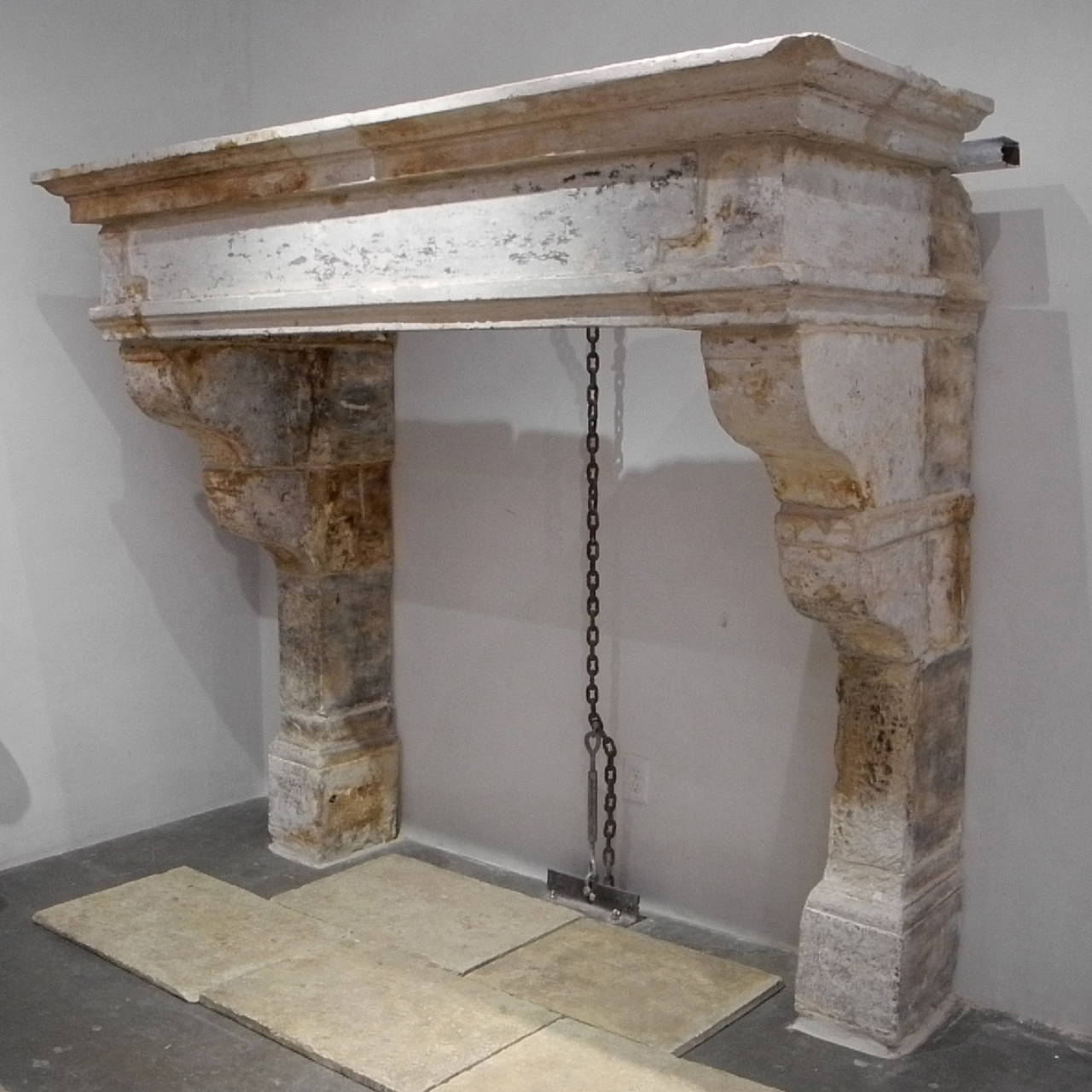 This 17th century fireplace was reclaimed from a Bastide near the Provençal town of St. Remy, France. 

This monumental piece is perfect for a large living area or den. The inside dimensions are 57.5 H x 61.75 W.