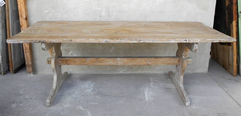 This 18th century Swedish breakfast table is lovely in its simplicity. It has a natural wood finish with minimal patina. It has carved legs and is large enough to serve in a casual breakfast room or even in a formal dining room. 