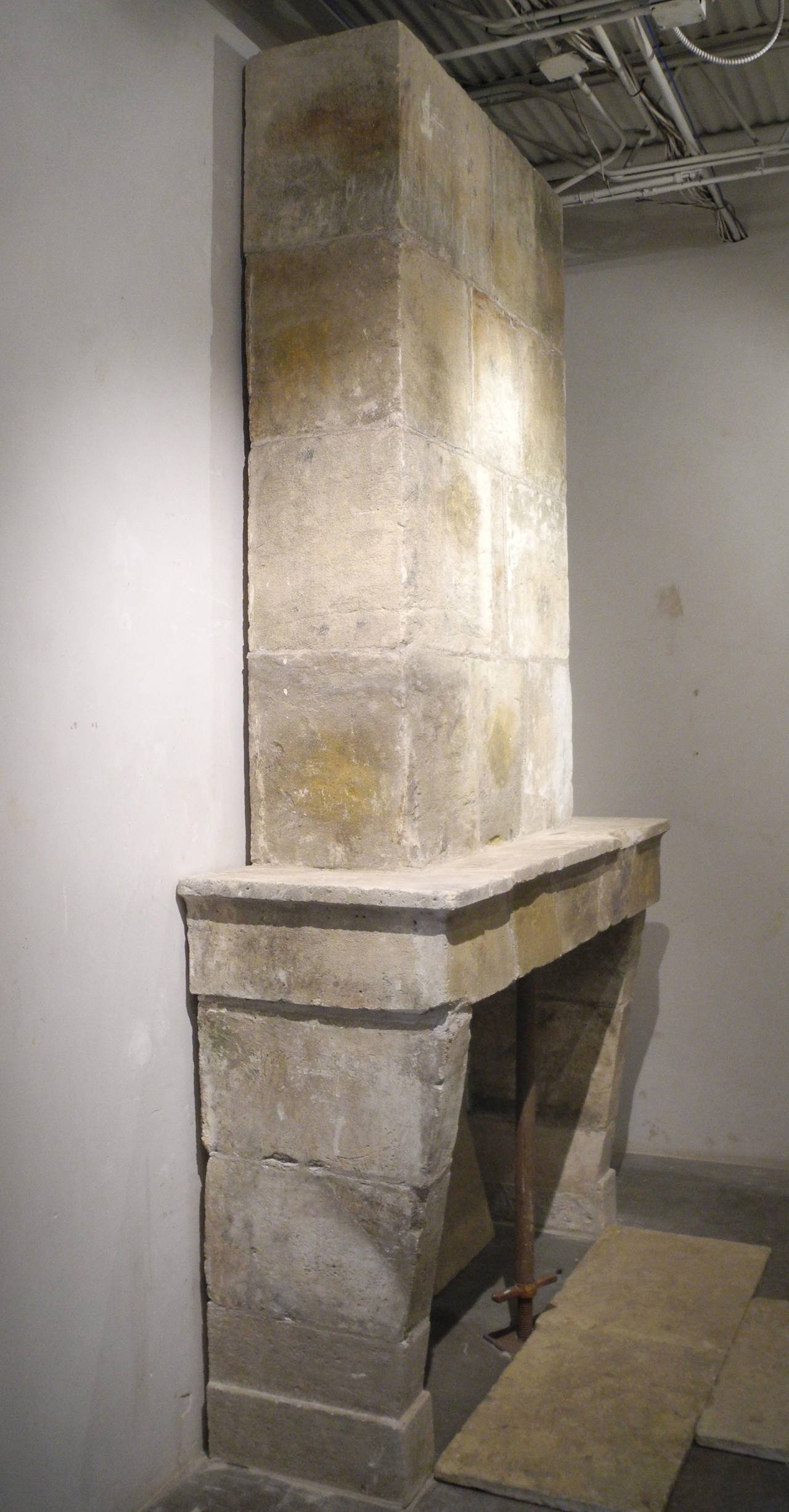 This 17th century fireplace with trumeau was reclaimed from a Mas outside of Uzes, France.